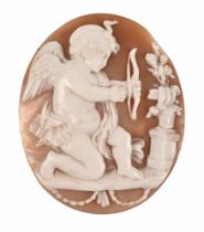 A carved cameo with Cupid decoration. Length 5 cm.