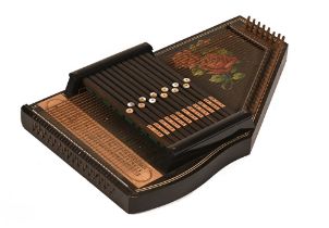An early 20th century Auto Harp, the body decorated with roses and with mother of pearl buttons,