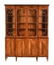 A George III style inlaid mahogany breakfront bookcase,