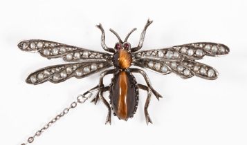 A silver coloured metal marcasite and seed pearl set insect brooch, with tiger's eye stones.