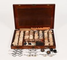 A mahogany cased opticians lens set.