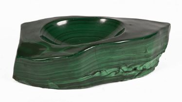 A mineral specimen of green agate, carved into a dish. Height +/- 6 cm x 21 cm x 12 cm.