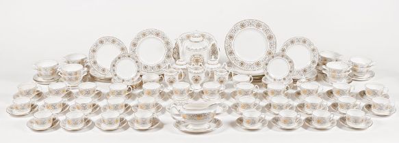 A Coalport Spanish lace patterned dinner and tea service, comprising 12 soup bowls and saucers,