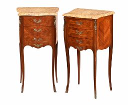 A pair of continental three drawer veneered marble topped bedside cabinets,