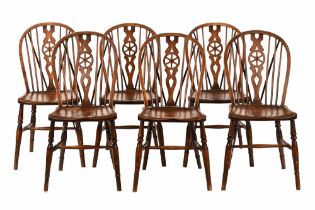 A set of six Windsor wheel back dining chairs,
