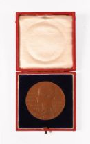 A cased medallion commemorating Queen Victorias 50th year as Queen.