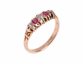 A yellow metal diamond and ruby ring, Size P/Q.