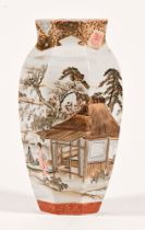 A Kutani eggshell octagonal vase, decorated with bridges houses and figures,