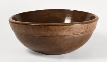 An extra large turned wooden dairy bowl, mid to late 19th century.