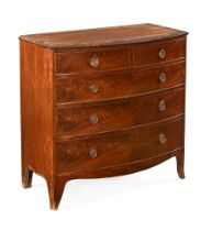 An early 19th century mahogany bowfronted chest of drawers,