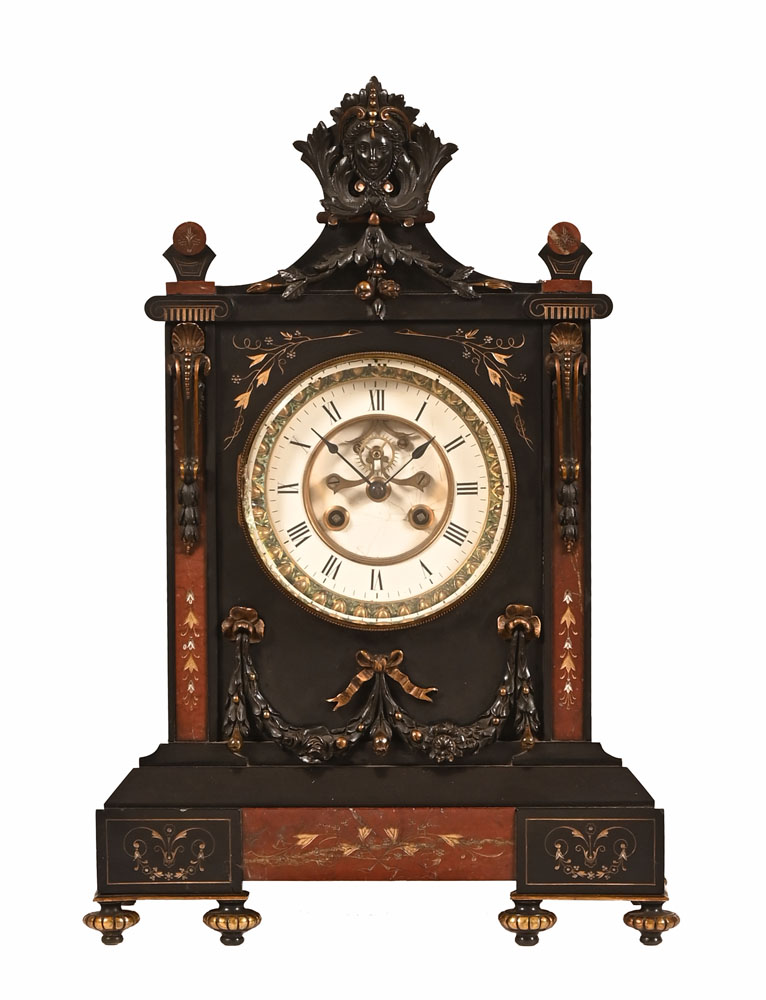 A late 19th century black slate and marble mantel clock,