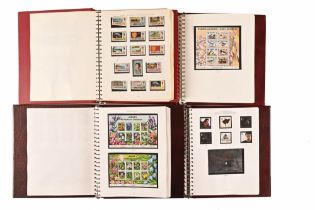 Four albums of Mint Jersey stamps,