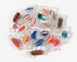 Nineteen Venetian glass sweets, various colours and styles.