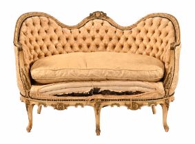 A continental cream and gilt salon sofa,