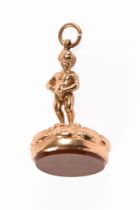 A 9 ct gold hallmarked blood stone seal, with Brussells boy fountain pendant mount.