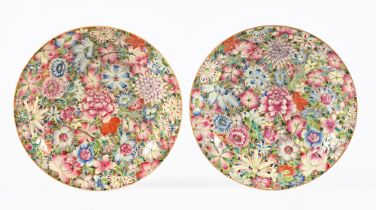 A pair of antique Chinese floral patterned dishes. Diameter 20 cm.