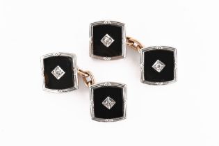 A pair of 9 ct gold black enamel and diamond cufflinks. Overall weight 5.6 grams.