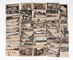 Seventy French postcards, depicting soldiers, shepherds, snow scenes etc.