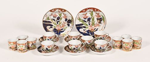 A part tea set in the manner of Derby, decorated in floral and gilt design,