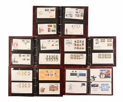 Five volumes of Guernsey first day covers, in well presented albums.