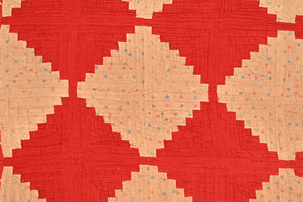 A patchwork quilt in red and beige, lined to back and edged with dogtooth points. 240 cm square. - Image 2 of 2