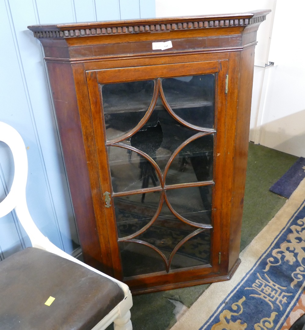 Georgian mahogany corner cupboard with dentil cornice and glazed door (one glazed panel broken)