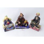 Three Royal Doulton figurines "The Potter" "Mendicant" and "Abdullah"