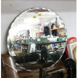 Bevelled edge frameless round mirror,