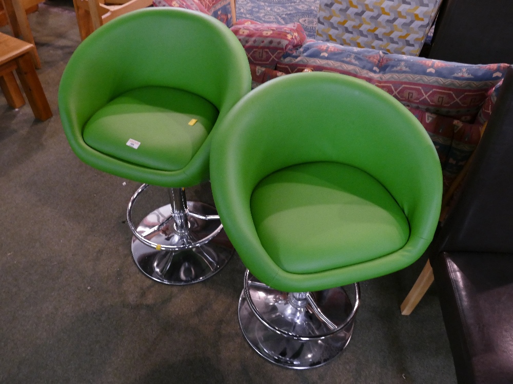 Two green retro style bar/kitchen chairs