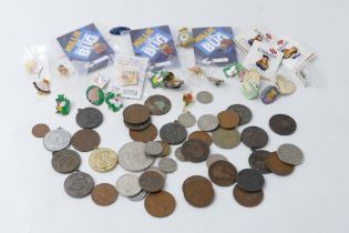 Bag of vintage coins and enamel pin badges including Cedric The Dragon and Millie The Millennium