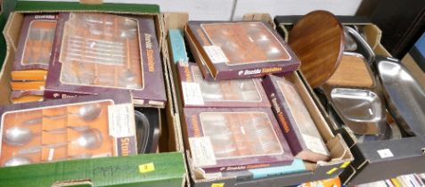 Three boxes of Old Hall and stainless trays and serving dishes and boxed Oneida cutlery sets