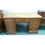 Green leather tooled top writing desk, height 75 cm,