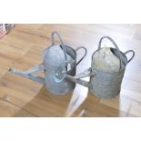 Pair of galvanized watering cans