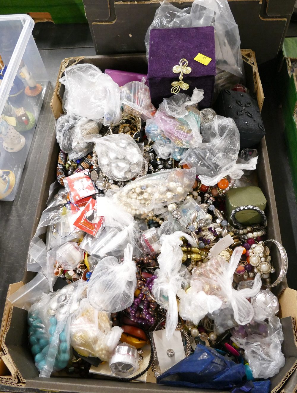 Box of vintage costume jewellery including beaded necklaces, bangles, brooches,