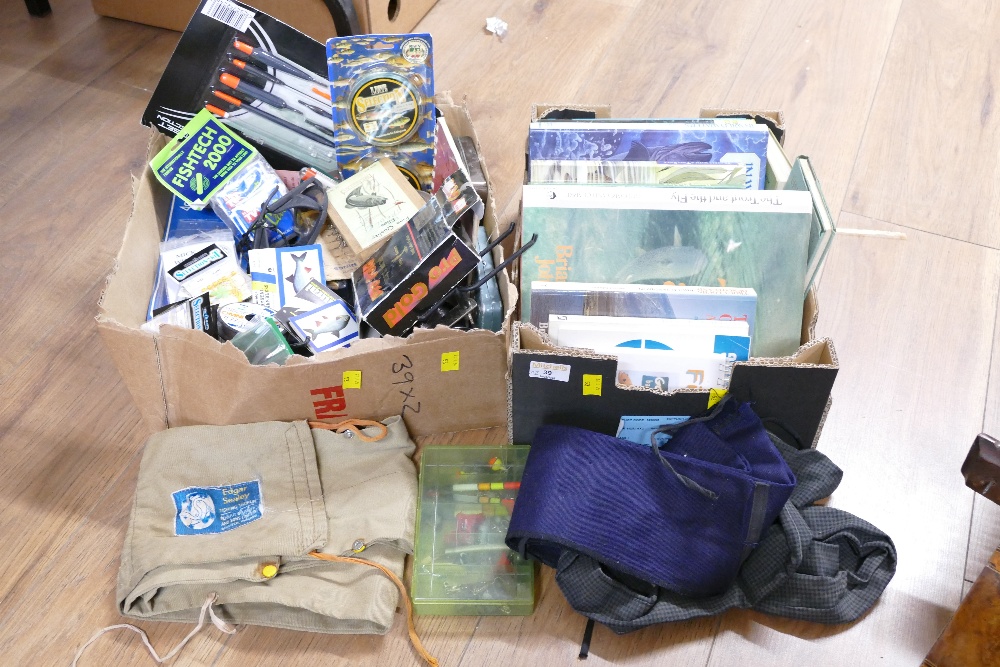 Two boxes of fishing equipment and books