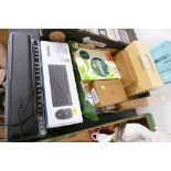 Box of wireless router, boxed HP projector, BT Home phones, WiFi disc,