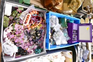 Two boxes of costume jewellery including beads, necklaces, brooches,