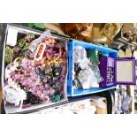 Two boxes of costume jewellery including beads, necklaces, brooches,