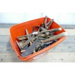 Tub of tools which includes hammers, spanners, chisels, etc.