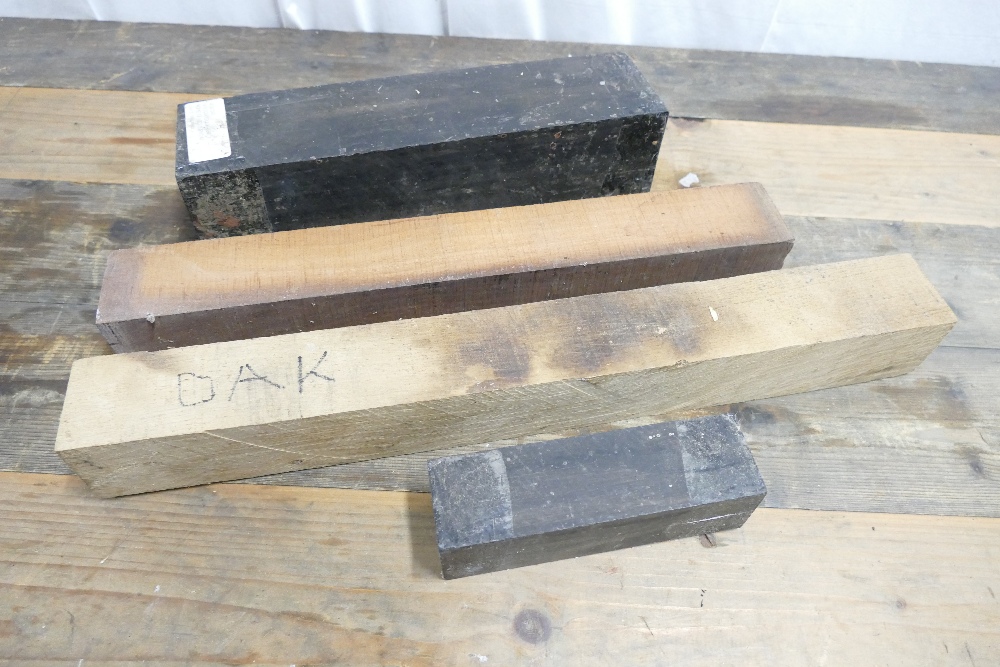 Box containing mixed hardwood turning/carving blanks which include Oak, Ebony etc in various sizes.