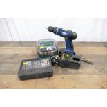 Power Craft cordless drill with charger and battery, and 2 sets of multi tool accessories.