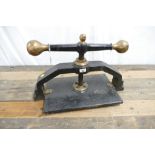 Large black and gold cast iron book/fly press.