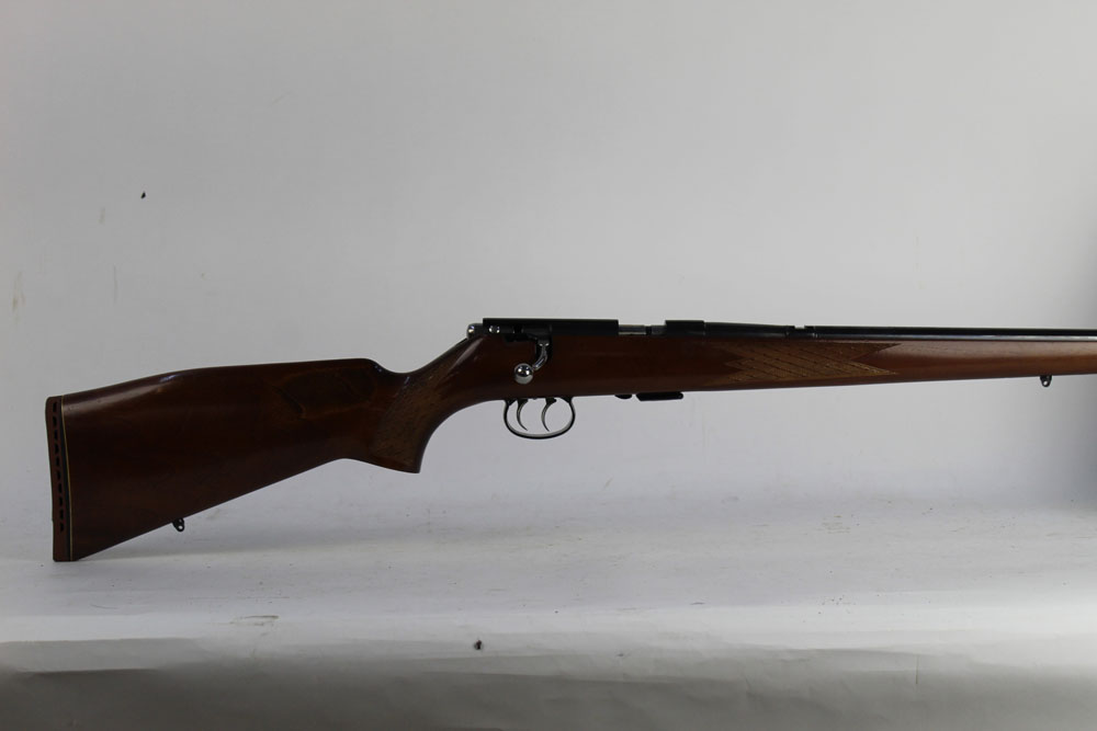An Anschutz Model 1418 Stutzen cal 22 LR bolt action rifle, fitted with a sound moderator,