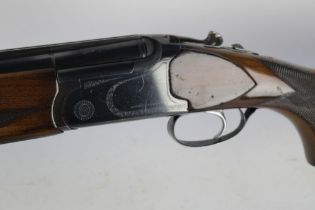 A Super Lanber 12 bore over/under shotgun, with 28" multichoke barrels, 70 mm chambers, ejector,