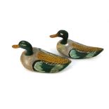 A pair of 20th century decoy ducks, beak to tail 37 cm.