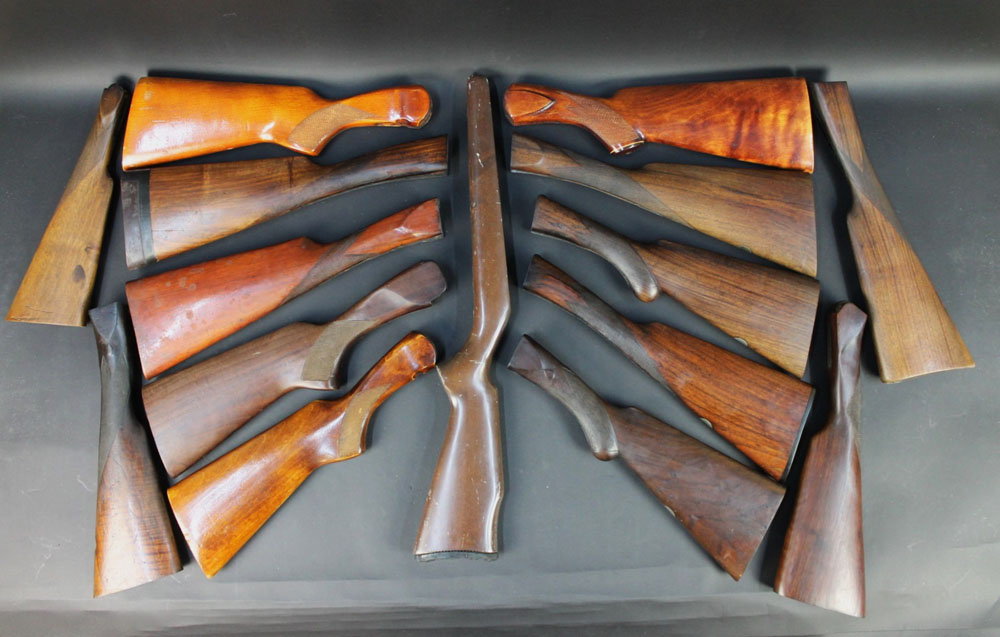 A box containing shotgun stocks, various different styles. - Image 2 of 2