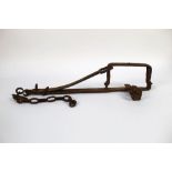 A vintage trap, +/- 45 cm in length excluding chain.