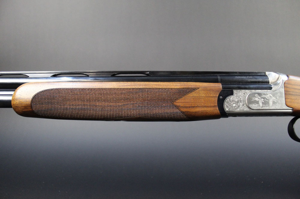 A Zoli 20 bore over/under game shotgun, with 29 1/2" multi choke barrels, 76 mm chambers, boxlock, - Image 7 of 10