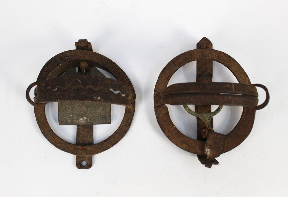 Two vintage pole traps, the first the plate marked Shaw and having a 14 cm diameter,