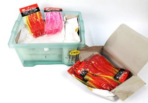 Four boxes of Octopus bait sea fishing lures.